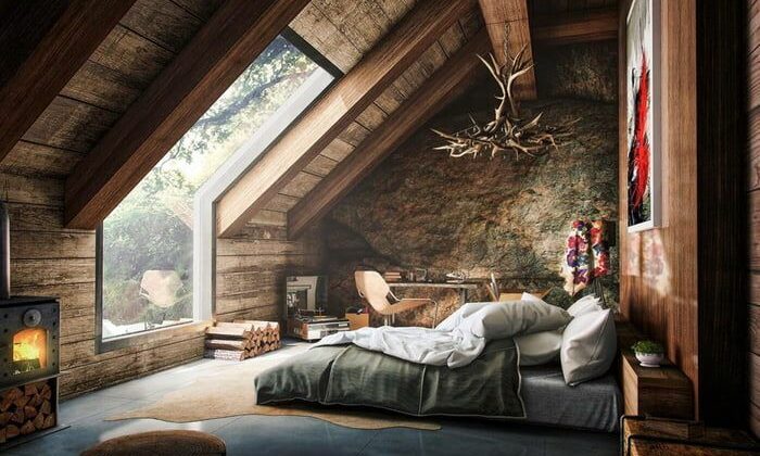 A cozy attic bedroom with skylights and modern decor