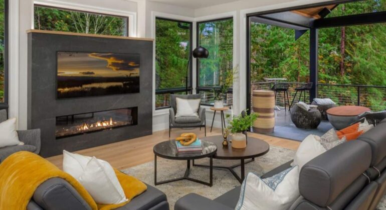 A bright and airy living room featuring energy-efficient windows and lighting.